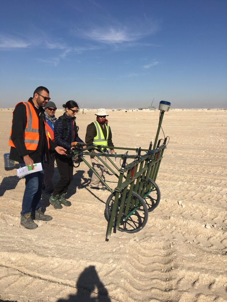 Alice Taylor trying out a non intrusive survey in the desert during a project visit to Kuwait.
