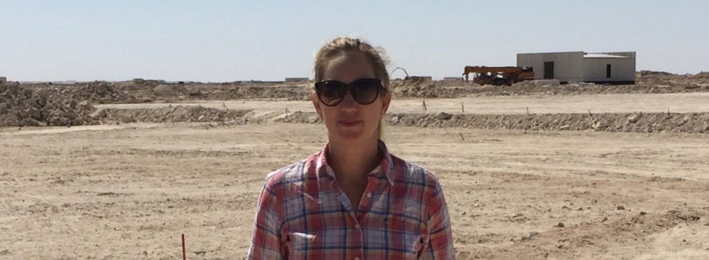International Business Development Manager Åsa Gilbert on a field visit to a project in Kuwait. Pictured in a desert.